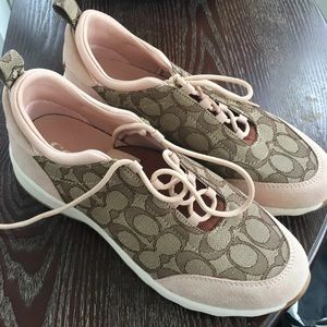 Coach running shoes! Size 9.5 women’s in great condition. Only wore once.